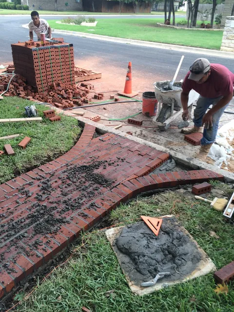 Laying a red brick walkway in running bond