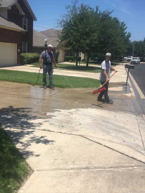Finishing and washing down a new driveway