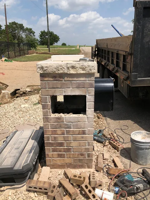 Brick mailbox column under construction